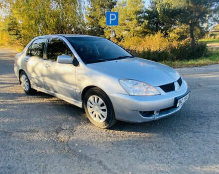 Мицубиси Лансер 2006 в Львове на Automoto.ua Серый Мицубиси Лансер, объемом двигателя 1.6 л и пробегом 253 тыс. км за 2499 $, фото 3 на Automoto.ua