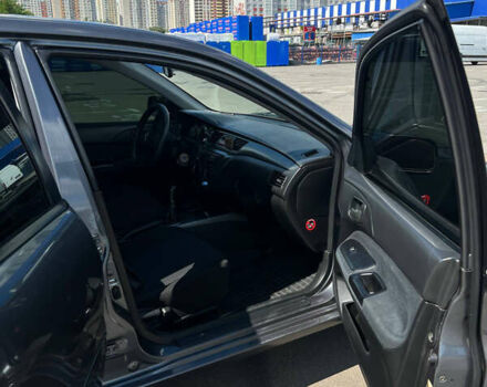Сірий Міцубісі Lancer, об'ємом двигуна 1.6 л та пробігом 223 тис. км за 4500 $, фото 10 на Automoto.ua