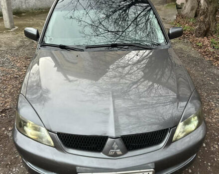 Сірий Міцубісі Lancer, об'ємом двигуна 2 л та пробігом 200 тис. км за 4999 $, фото 3 на Automoto.ua