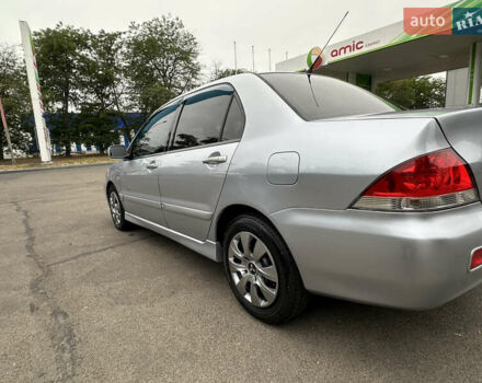 Серый Мицубиси Лансер, объемом двигателя 1.58 л и пробегом 183 тыс. км за 4800 $, фото 6 на Automoto.ua