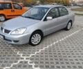 Сірий Міцубісі Lancer, об'ємом двигуна 1.6 л та пробігом 267 тис. км за 3600 $, фото 1 на Automoto.ua