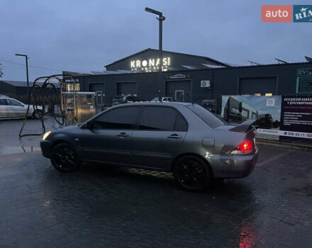 Серый Мицубиси Лансер, объемом двигателя 1.6 л и пробегом 213 тыс. км за 4500 $, фото 4 на Automoto.ua