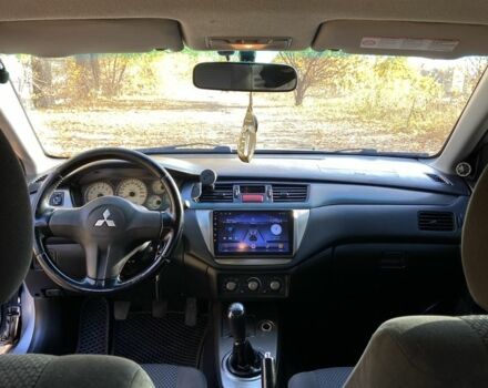 Серый Мицубиси Лансер, объемом двигателя 1.6 л и пробегом 204 тыс. км за 3999 $, фото 14 на Automoto.ua