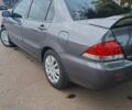 Сірий Міцубісі Lancer, об'ємом двигуна 1.6 л та пробігом 229 тис. км за 4900 $, фото 5 на Automoto.ua