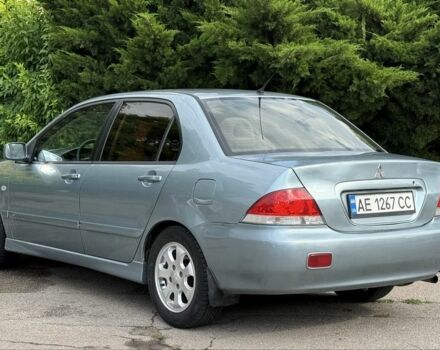 Серый Мицубиси Лансер, объемом двигателя 1.6 л и пробегом 220 тыс. км за 4400 $, фото 3 на Automoto.ua