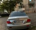 Сірий Міцубісі Lancer, об'ємом двигуна 1.6 л та пробігом 225 тис. км за 4200 $, фото 1 на Automoto.ua