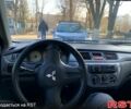 Сірий Міцубісі Lancer, об'ємом двигуна 1.6 л та пробігом 300 тис. км за 4400 $, фото 4 на Automoto.ua