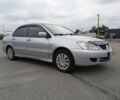 Сірий Міцубісі Lancer, об'ємом двигуна 1.6 л та пробігом 300 тис. км за 2999 $, фото 3 на Automoto.ua