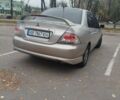 Сірий Міцубісі Lancer, об'ємом двигуна 2 л та пробігом 330 тис. км за 3450 $, фото 2 на Automoto.ua