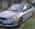 Сірий Міцубісі Lancer, об'ємом двигуна 1.6 л та пробігом 361 тис. км за 3000 $, фото 1 на Automoto.ua