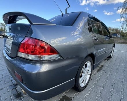 Мицубиси Лансер 2006 в Черновцах на Automoto.ua Серый Мицубиси Лансер, объемом двигателя 1.6 л и пробегом 263 тыс. км за 4500 $, фото 2 на Automoto.ua