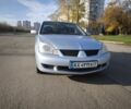 Сірий Міцубісі Lancer, об'ємом двигуна 1.6 л та пробігом 340 тис. км за 3000 $, фото 1 на Automoto.ua