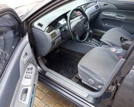 Сірий Міцубісі Lancer, об'ємом двигуна 2 л та пробігом 212 тис. км за 3333 $, фото 11 на Automoto.ua