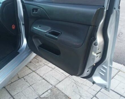 Мицубиси Лансер 2006 в Каменское - Днепродзержинск на Automoto.ua Серый Мицубиси Лансер, объемом двигателя 1.58 л и пробегом 238 тыс. км за 5400 $, фото 6 на Automoto.ua