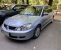 Сірий Міцубісі Lancer, об'ємом двигуна 1.6 л та пробігом 227 тис. км за 4300 $, фото 2 на Automoto.ua