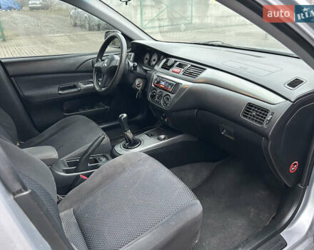 Сірий Міцубісі Lancer, об'ємом двигуна 1.6 л та пробігом 223 тис. км за 3900 $, фото 10 на Automoto.ua