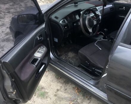 Міцубісі Lancer 2006 у Синельниковом на Automoto.ua Сірий Міцубісі Lancer, об'ємом двигуна 2 л та пробігом 200 тис. км за 3000 $, фото 3 на Automoto.ua
