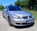 Серый Мицубиси Лансер, объемом двигателя 1.6 л и пробегом 182 тыс. км за 5400 $, фото 1 на Automoto.ua
