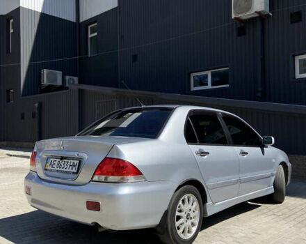 Сірий Міцубісі Lancer, об'ємом двигуна 1.6 л та пробігом 200 тис. км за 4400 $, фото 6 на Automoto.ua