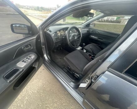 Серый Мицубиси Лансер, объемом двигателя 1.6 л и пробегом 162 тыс. км за 4650 $, фото 5 на Automoto.ua