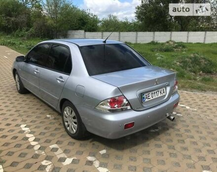 Сірий Міцубісі Lancer, об'ємом двигуна 1.58 л та пробігом 187 тис. км за 6500 $, фото 3 на Automoto.ua