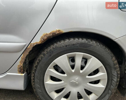 Сірий Міцубісі Lancer, об'ємом двигуна 1.58 л та пробігом 308 тис. км за 3700 $, фото 14 на Automoto.ua