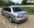 Сірий Міцубісі Lancer, об'ємом двигуна 1.58 л та пробігом 187 тис. км за 6500 $, фото 3 на Automoto.ua