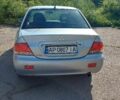 Сірий Міцубісі Lancer, об'ємом двигуна 0 л та пробігом 159 тис. км за 4500 $, фото 4 на Automoto.ua