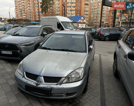 Серый Мицубиси Лансер, объемом двигателя 1.6 л и пробегом 310 тыс. км за 3500 $, фото 1 на Automoto.ua