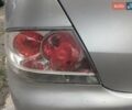 Серый Мицубиси Лансер, объемом двигателя 2 л и пробегом 290 тыс. км за 4200 $, фото 17 на Automoto.ua