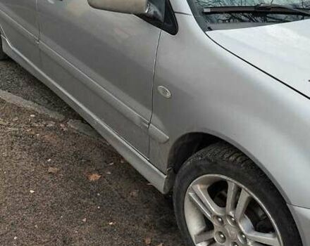 Серый Мицубиси Лансер, объемом двигателя 2 л и пробегом 284 тыс. км за 4100 $, фото 1 на Automoto.ua