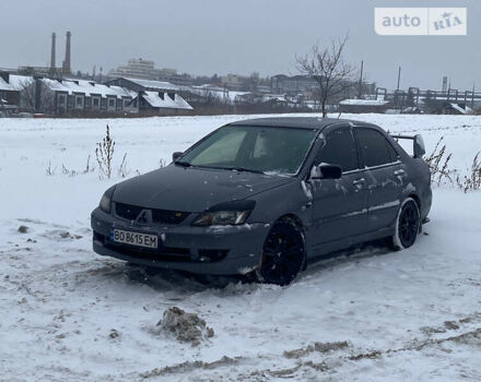 Сірий Міцубісі Lancer, об'ємом двигуна 1.58 л та пробігом 228 тис. км за 4300 $, фото 26 на Automoto.ua