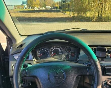 Мицубиси Лансер 2006 в Черновцах на Automoto.ua Серый Мицубиси Лансер, объемом двигателя 1.6 л и пробегом 299 тыс. км за 4300 $, фото 2 на Automoto.ua