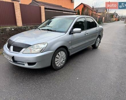 Сірий Міцубісі Lancer, об'ємом двигуна 1.58 л та пробігом 333 тис. км за 2750 $, фото 3 на Automoto.ua