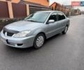 Сірий Міцубісі Lancer, об'ємом двигуна 1.58 л та пробігом 333 тис. км за 2750 $, фото 3 на Automoto.ua