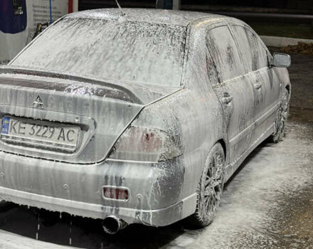 Серый Мицубиси Лансер, объемом двигателя 2 л и пробегом 256 тыс. км за 7000 $, фото 12 на Automoto.ua