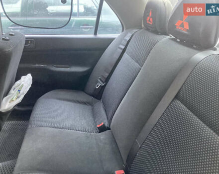 Сірий Міцубісі Lancer, об'ємом двигуна 1.6 л та пробігом 222 тис. км за 4900 $, фото 11 на Automoto.ua