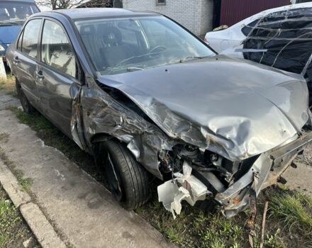 Сірий Міцубісі Lancer, об'ємом двигуна 1.6 л та пробігом 200 тис. км за 1150 $, фото 1 на Automoto.ua