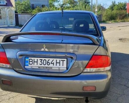 Сірий Міцубісі Lancer, об'ємом двигуна 1.6 л та пробігом 229 тис. км за 4900 $, фото 10 на Automoto.ua