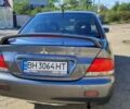 Сірий Міцубісі Lancer, об'ємом двигуна 1.6 л та пробігом 229 тис. км за 4900 $, фото 10 на Automoto.ua