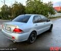 Сірий Міцубісі Lancer, об'ємом двигуна 1.6 л та пробігом 310 тис. км за 2900 $, фото 4 на Automoto.ua
