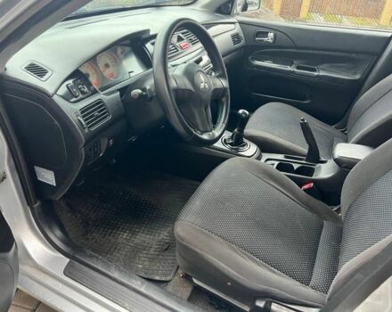 Серый Мицубиси Лансер, объемом двигателя 1.6 л и пробегом 333 тыс. км за 2800 $, фото 10 на Automoto.ua