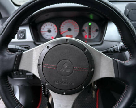 Серый Мицубиси Лансер, объемом двигателя 2 л и пробегом 256 тыс. км за 7000 $, фото 7 на Automoto.ua