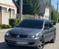Серый Мицубиси Лансер, объемом двигателя 1.6 л и пробегом 284 тыс. км за 3500 $, фото 1 на Automoto.ua