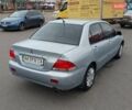 Мицубиси Лансер 2006 в Киеве на Automoto.ua Серый Мицубиси Лансер, объемом двигателя 1.6 л и пробегом 426 тыс. км за 3800 $, фото 4 на Automoto.ua