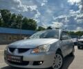 Сірий Міцубісі Lancer, об'ємом двигуна 1.6 л та пробігом 294 тис. км за 4700 $, фото 1 на Automoto.ua