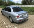 Сірий Міцубісі Lancer, об'ємом двигуна 0 л та пробігом 187 тис. км за 7000 $, фото 5 на Automoto.ua