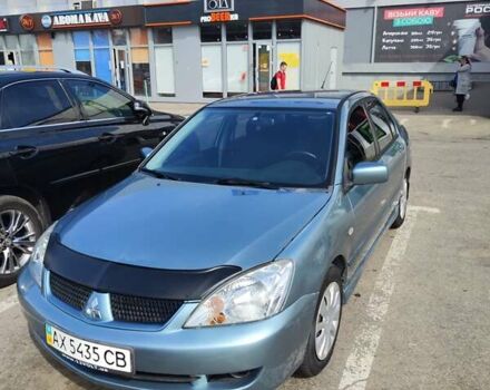 Сірий Міцубісі Lancer, об'ємом двигуна 1.6 л та пробігом 212 тис. км за 4700 $, фото 1 на Automoto.ua