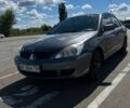 Серый Мицубиси Лансер, объемом двигателя 1.6 л и пробегом 223 тыс. км за 4500 $, фото 6 на Automoto.ua