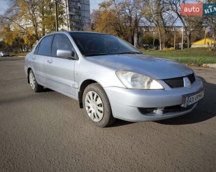 Серый Мицубиси Лансер, объемом двигателя 1.6 л и пробегом 344 тыс. км за 3400 $, фото 7 на Automoto.ua